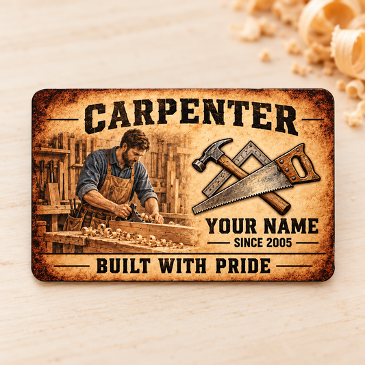 Front of the Carpenter Sepia Legacy aluminum wallet card on a cream desk.