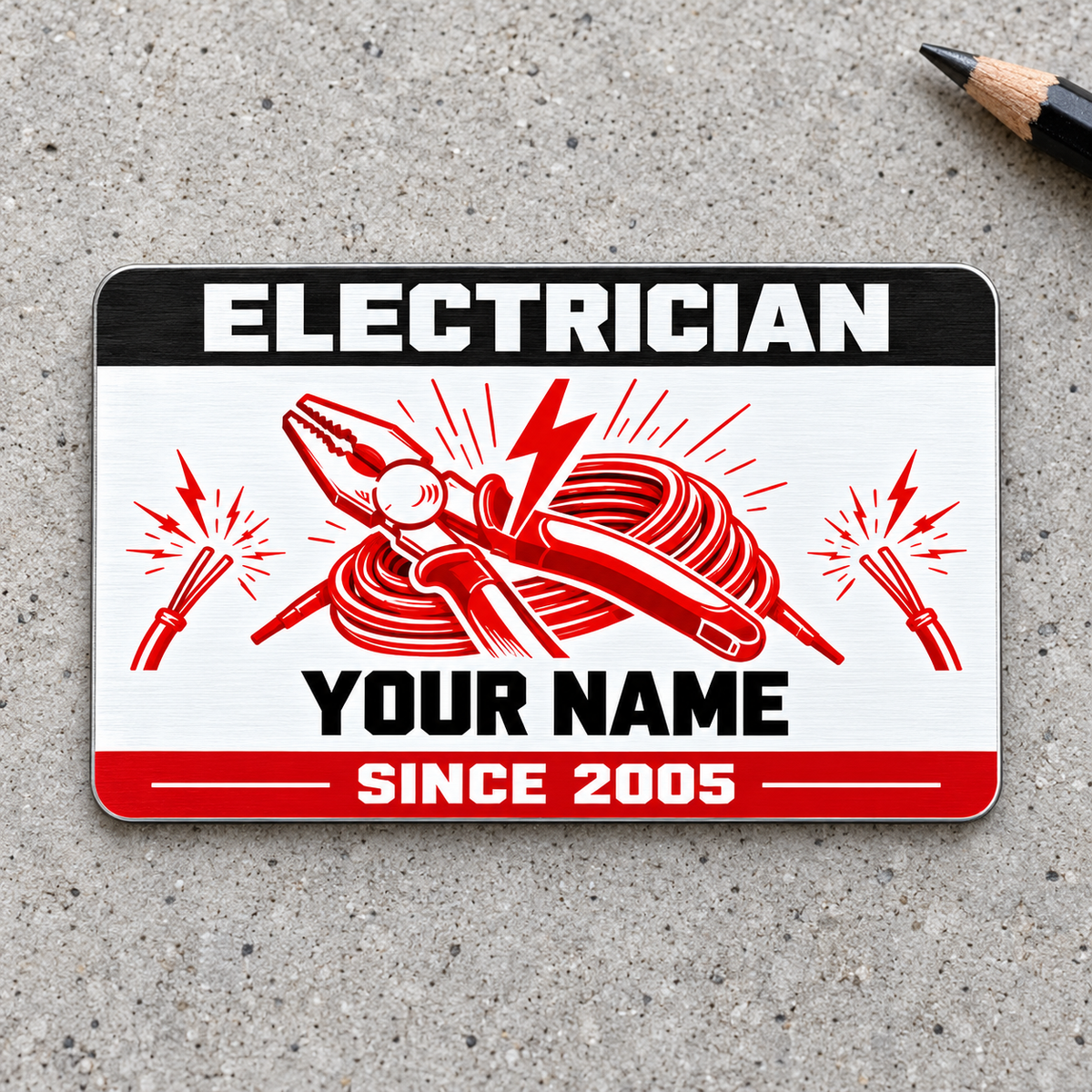 Electrician Red Monochrome aluminum wallet card, front view on light gray concrete