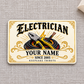 Electrician Ivory Heritage aluminum wallet card, front view on gray linen