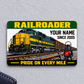 Railroader Green Band aluminum wallet card front centered on pale gray fabric.