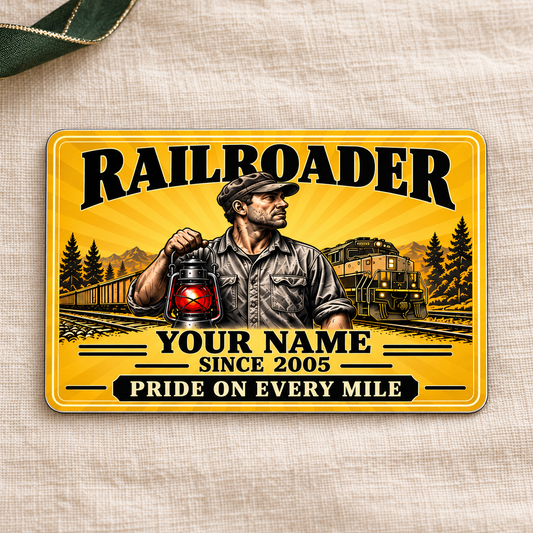 Railroader Golden Milestone aluminum wallet card front on cream linen.