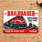 Railroader Signature Modern aluminum wallet card front on a pale wooden surface.