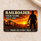 Railroader Sunset Workday aluminum wallet card front centered on light warm stone.