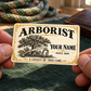Arborist wallet card in an arborist tree-care rest area with an adult man and leather wallet.