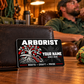 Arborist wallet card in a arborist tree-care rest area with an adult man and leather wallet.