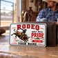 Bull Riding/Rodeo Honeycomb Pride wallet card against a closed brown wallet with a seated rider behind