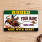 Bull Riding Rodeo Green Band aluminum wallet card front on pale oak
