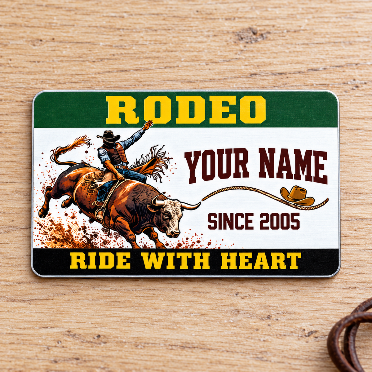 Bull Riding Rodeo Green Band aluminum wallet card front on pale oak