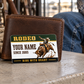 Bull Riding/Rodeo Heritage Band aluminum wallet card against a closed brown wallet on a pale concrete table