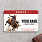 Bull Riding Rodeo Red Header aluminum wallet card, front design on gray concrete