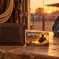 Bull Riding/Rodeo Sunset Workday aluminum wallet card beside a closed brown wallet at sunset