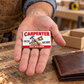 The printed front of the Carpenter Signature Classic aluminum wallet card shown in an occupational lifestyle setting with an adult worker.