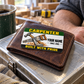 The printed front of the Carpenter Green Band Appreciation aluminum wallet card shown in an occupational lifestyle setting with an adult worker.