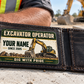 The printed front of the Excavator Operator Heritage Band Appreciation aluminum wallet card shown in an occupational lifestyle setting with an adult worker.