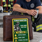 Firefighter wallet card in a fire station with an adult man and leather wallet.