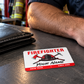 Firefighter wallet card in a fire station with an adult man and leather wallet.