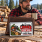 Logger wallet card in a forest logging rest area with an adult man and leather wallet.
