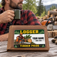 Logger wallet card in a forest logging rest area with an adult man and leather wallet.