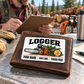 Logger wallet card in a forest logging rest area with an adult man and leather wallet.