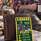 Logger wallet card in a forest logging rest area with an adult man and leather wallet.
