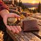 Logger wallet card in a forest logging rest area with an adult man and leather wallet.