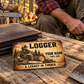 Logger wallet card in a forest logging rest area with an adult man and leather wallet.