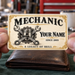Mechanic Ivory Heritage aluminum wallet card shown at wallet scale in an automotive workshop setting.