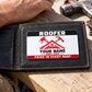 The printed front of the Roofer Red Monochrome Craft aluminum wallet card shown in an occupational lifestyle setting with an adult worker.