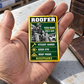 The printed front of the Roofer Trade Legend Collectible aluminum wallet card shown in an occupational lifestyle setting with an adult worker.