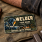 Welder Rugged Field card on olive canvas beside a wallet and resting worker's forearm
