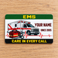 EMS aluminum wallet card with green and yellow bands on pale oak