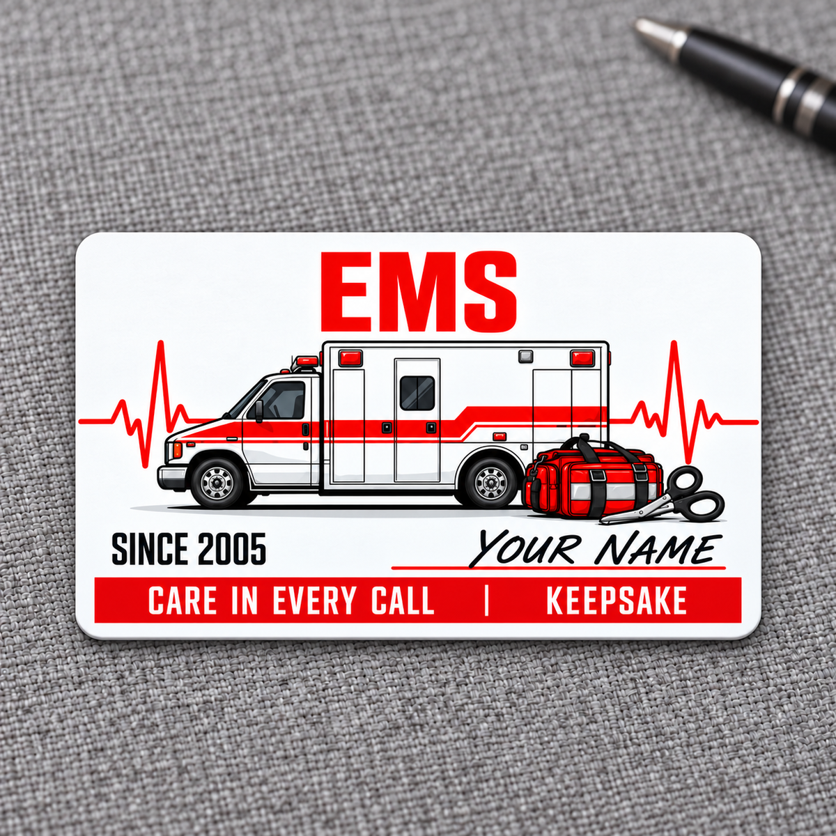 White and red EMS aluminum wallet card on gray woven fabric
