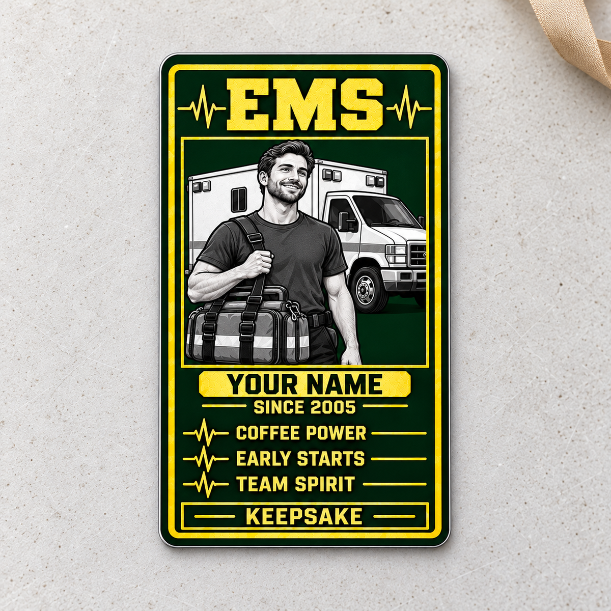 Portrait Trade Legend EMS aluminum wallet card on pale cream concrete