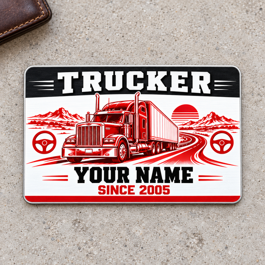 Trucker Red Monochrome aluminum wallet card front on warm gray concrete