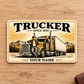 Front of Trucker Golden Milestone aluminum wallet card on pale oak