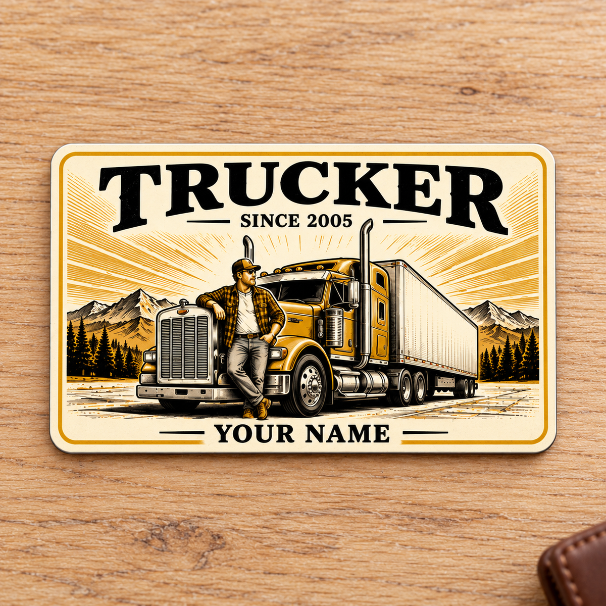 Front of Trucker Golden Milestone aluminum wallet card on pale oak