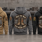 Five complete back views of the Welder Walk the Walk Badge Vintage Hoodie in Military Green, Kaki, Dark Gray, Black and Dark Blue, arranged at a quiet metalworking bench.