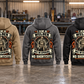 Five complete back views of the Welder Heritage Crest Vintage Hoodie in Military Green, Kaki, Dark Gray, Black and Dark Blue, arranged separately in a quiet metalworking workshop.